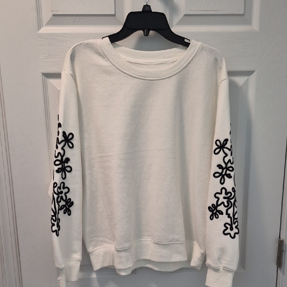 White Sweatshirt with Black Floral Sleeve Design